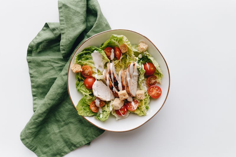 Coal fired chicken over fresh garden salad