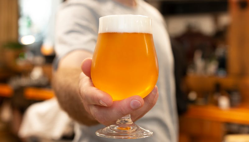 Cold craft draft beer poured in glass